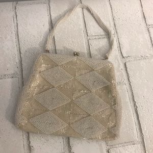 Vintage beaded wristlet in ivory